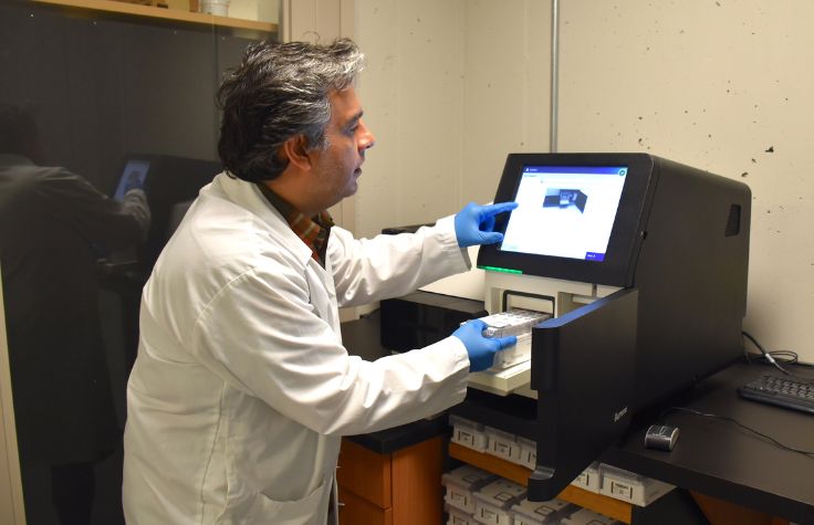 Dr. Mehrdad Hajibabaei works with the Illumina MiSeq System